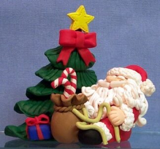 Santa with Tree - Santa sits tying sack of candyca