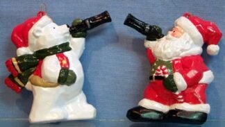 Polar Bear - stands drinking bottle of Coca-Cola