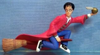 Harry - flying on Nimbus 2000 broom, gold snitch