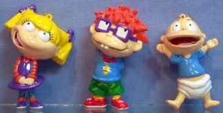 Angelica - stands partially smiling, hands on lap