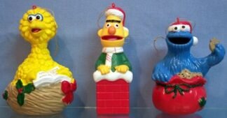 Bert - stands in chimney, wears Santa cap